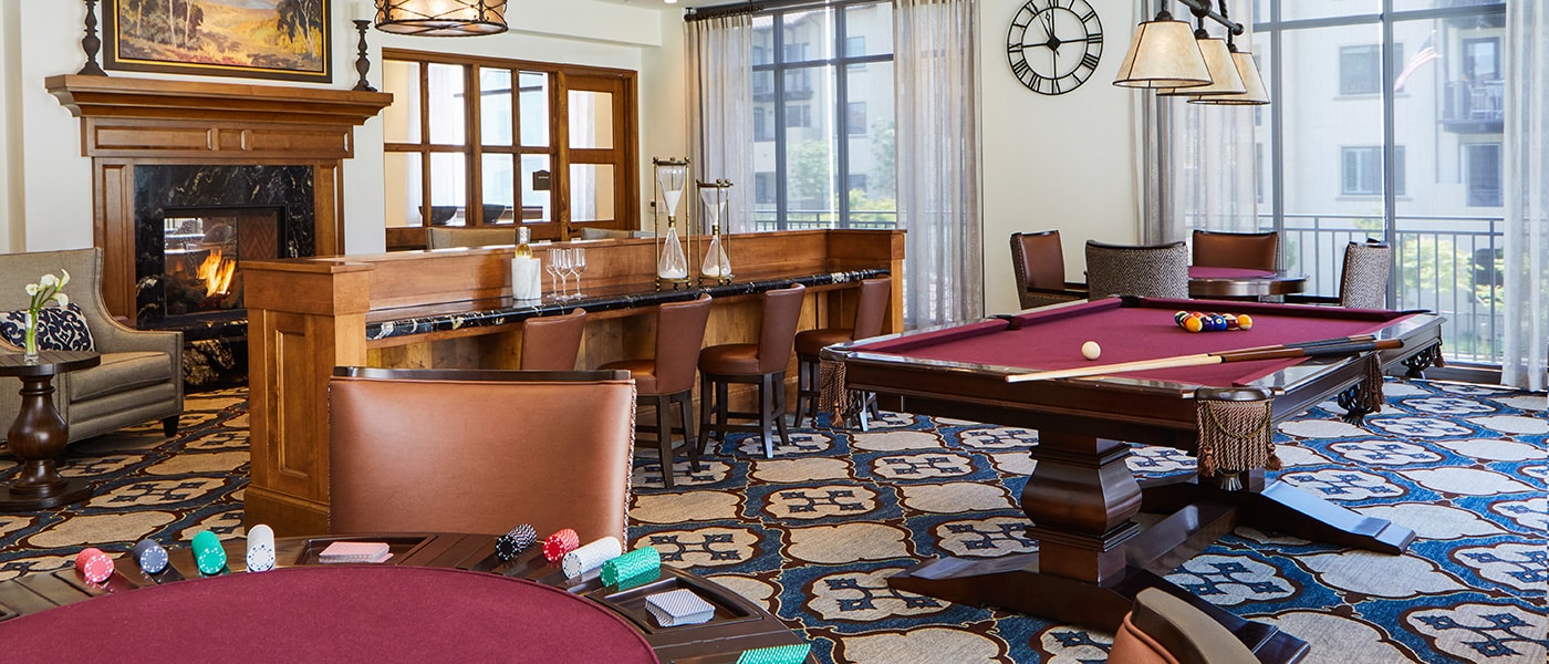 TheGlen-1400x600-7 A room with a poker and pool table
